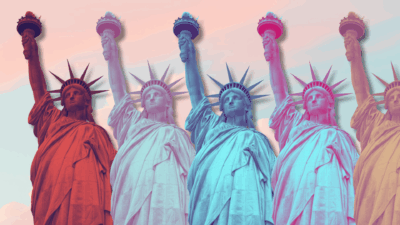 row of colorful statues of liberty
